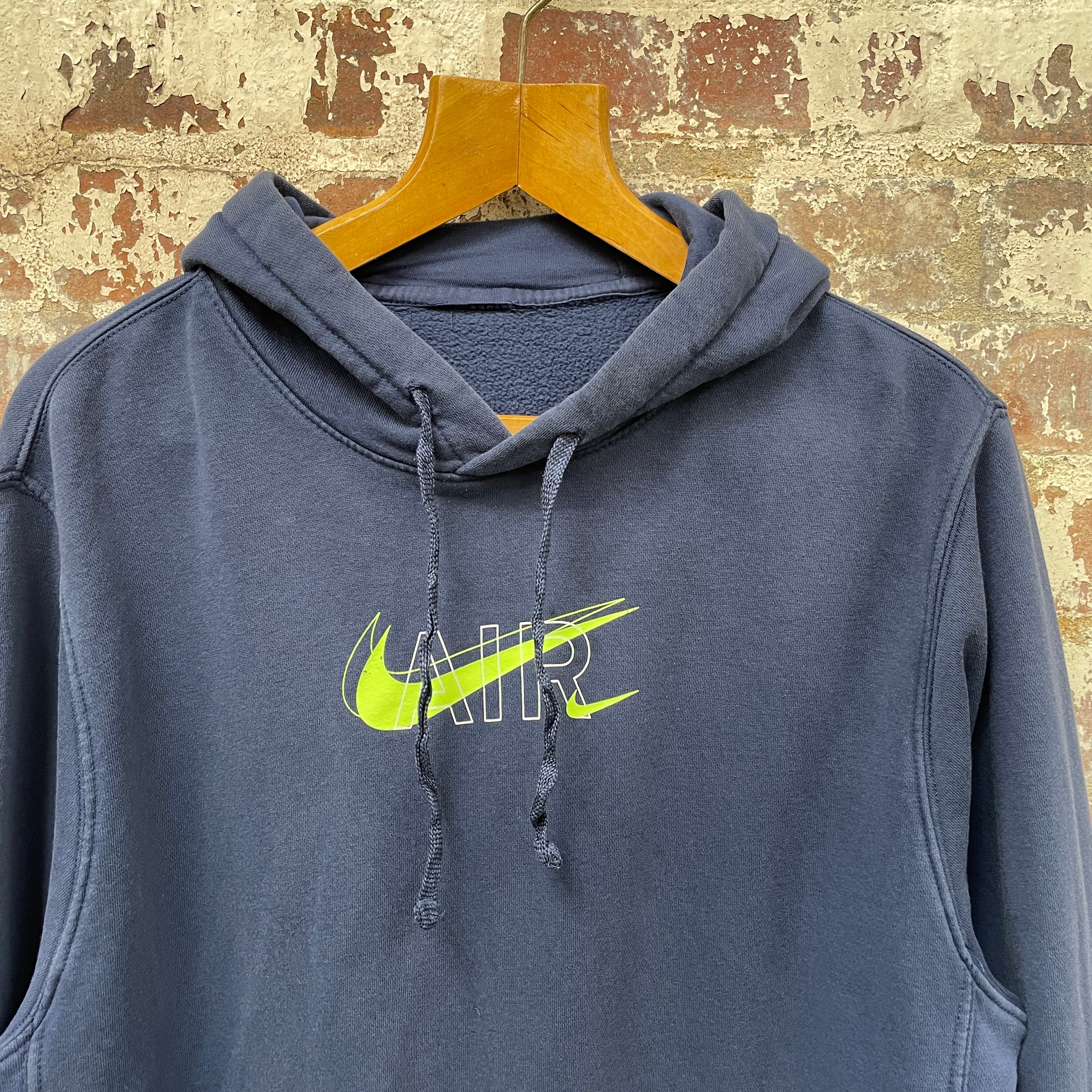 Grey nike hoodie with green online tick